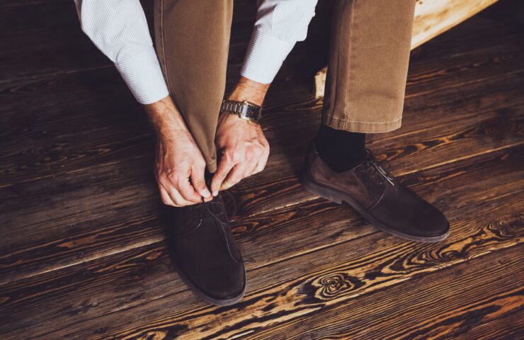 groom-reparations-for-the-wedding-wearing-brown-l-2024-09-14-05-21-20-min