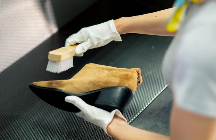 professional-dry-cleaning-a-young-girl-removes-a-s-2024-12-02-19-13-53-utc