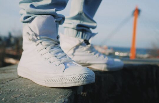 white-sneakers-man-in-high-top-shoes-outdoors-2025-03-07-15-11-29-utc